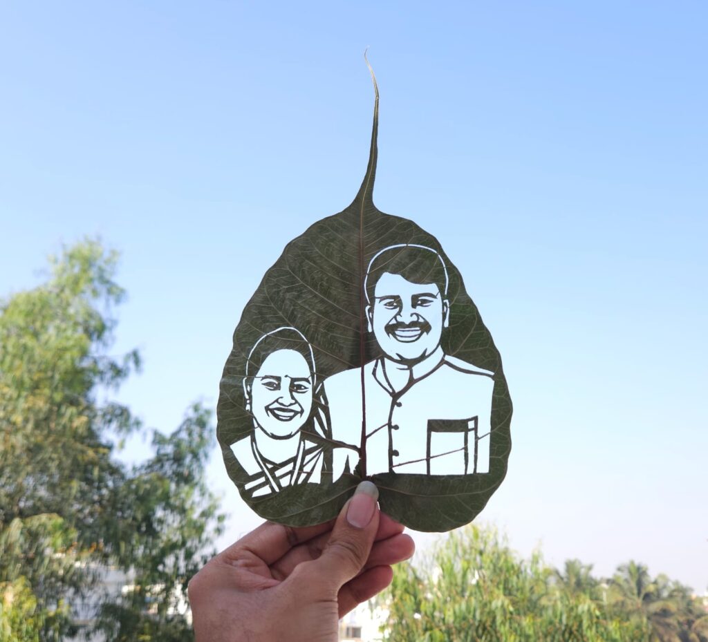 Leaf with cut-out couple portrait